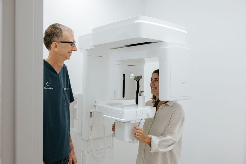 Dentist reviewing CBCT 3D dental scan for wisdom teeth assessment at Mary Street Dental in Gympie