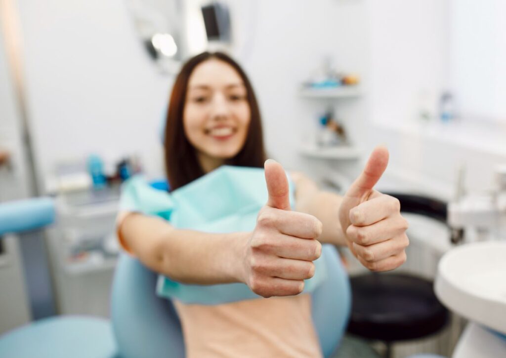 Patient experiencing severe tooth pain caused by a cracked tooth. Professional cracked tooth treatment in Gympie can repair damaged teeth and prevent infection or further tooth fracture.